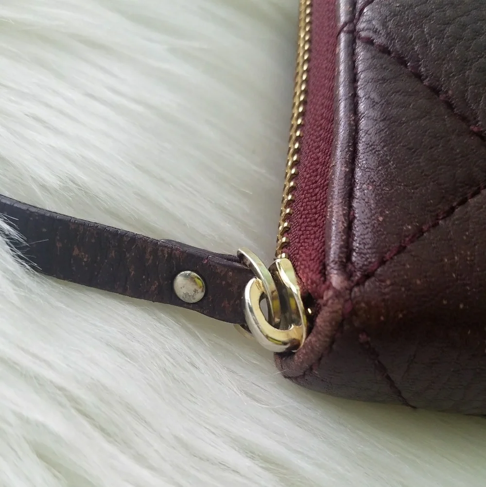 Kate Spade oxblood Quilted Zip Around Wallet